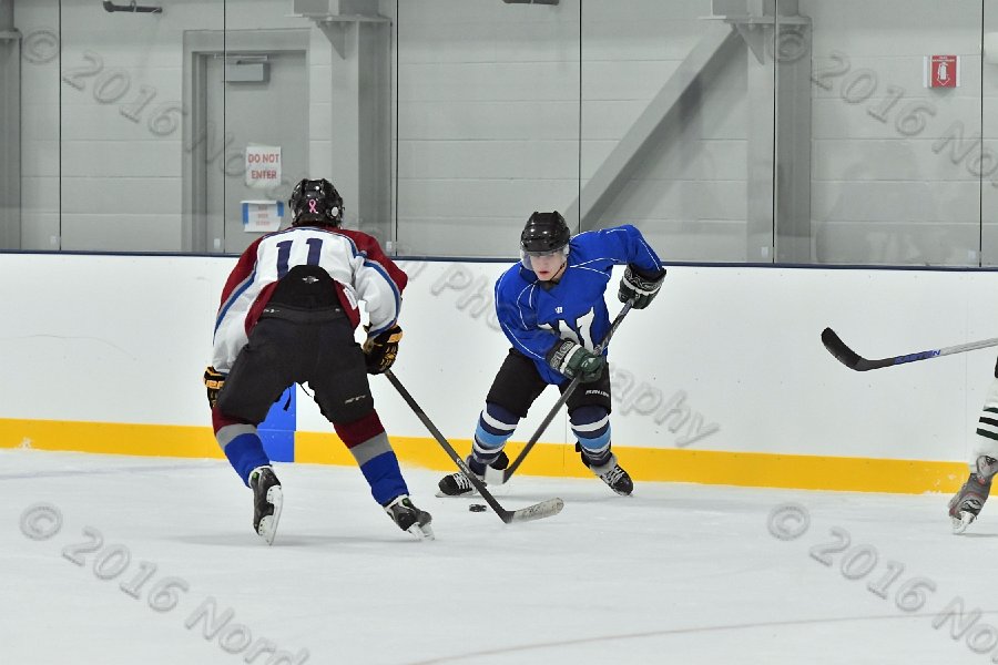 Wheaton College Men\'s Ice Hockey vs Middlesex Community College. - Photo By: KEITH NORDSTROM